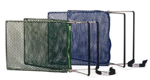 For safe animal capture in field operations, two long-handled nylon animal nets are positioned against a brick wall.